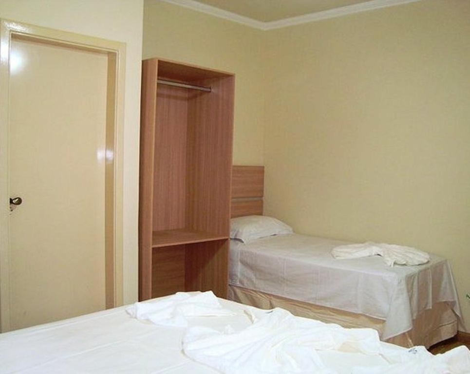 Hotel Perez Pouso Alegre Pokoj fotografie